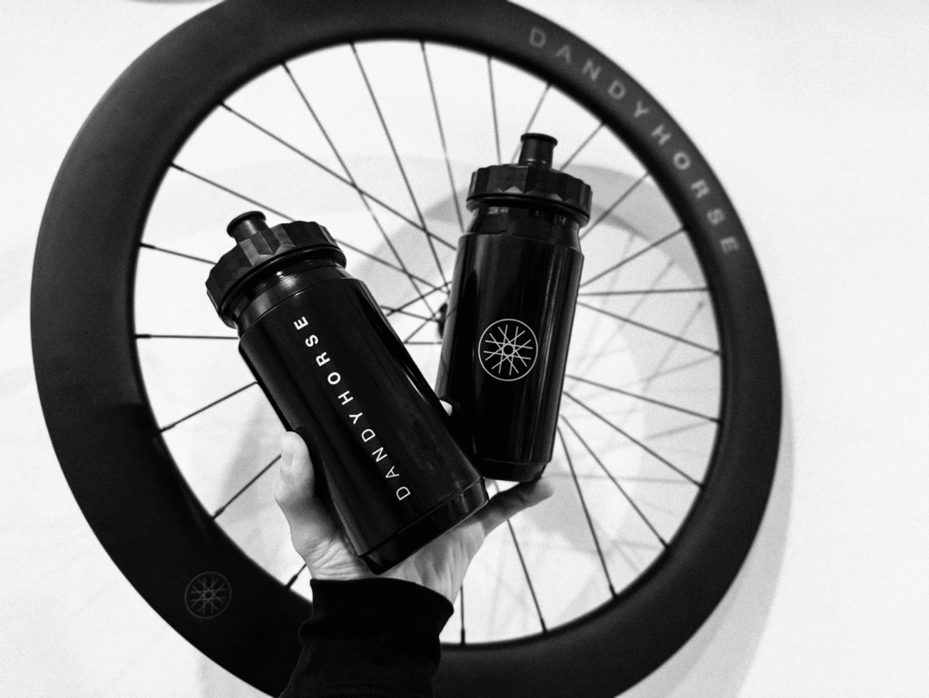 a set of two dandy horse bicycle water bottles